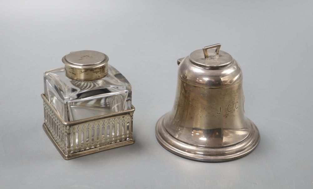 A George V silver bell shaped capstan inkwell, with loaded base, Birmingham 1915, height 7.5cm and a silver mounted glass inkwell,